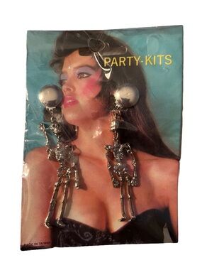 Vintage 80’s Skeleton clip in earring new in package